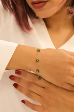 دستبند طلا گل همیشه بهار زمرد - تصویر 2